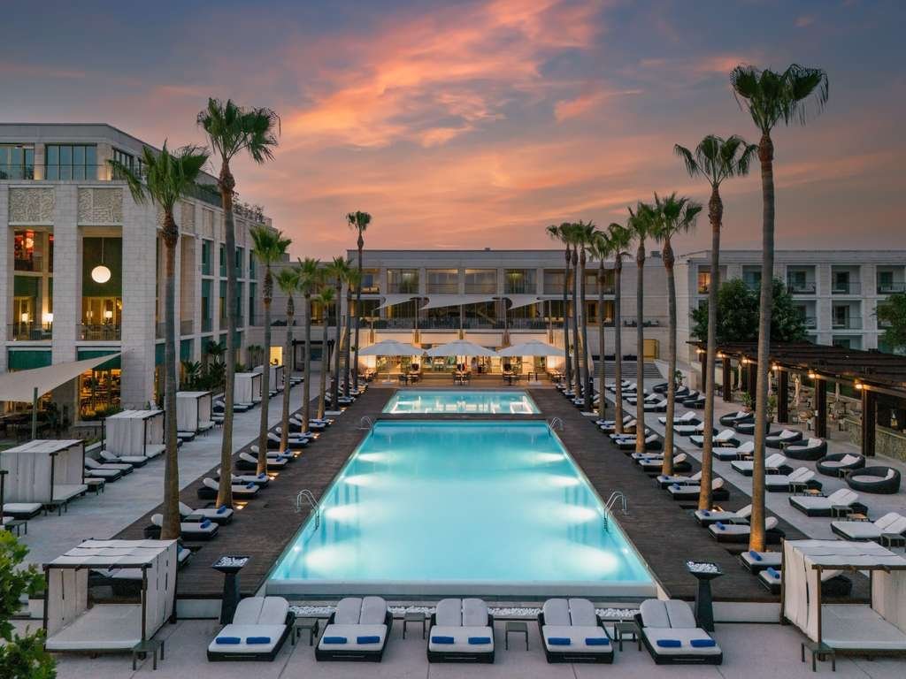 Victoria hotel pool terrace at dusk in Vilamoura, Portugal