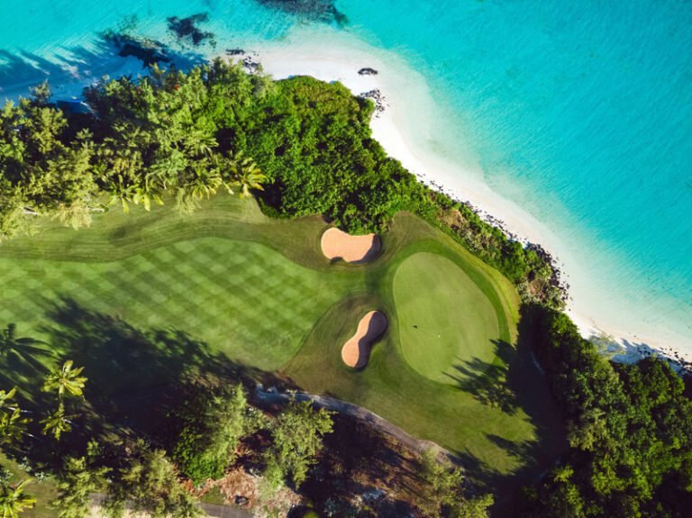 Aerial view of a golf hole beside the beach at Ile aux Cerfs, Mauritius